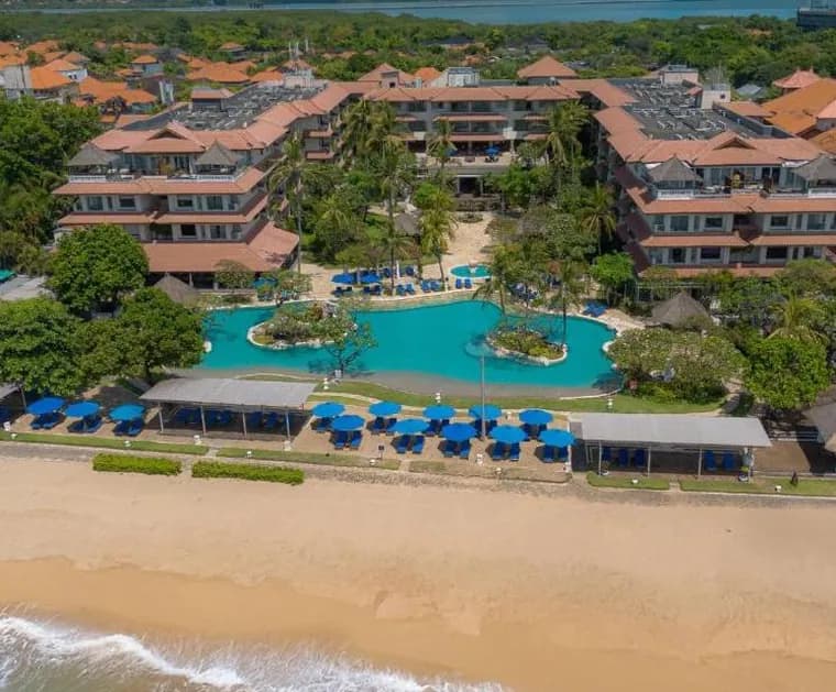 Beachfront resort with pool and tiled roofs at Tanjung Benoa, Bali