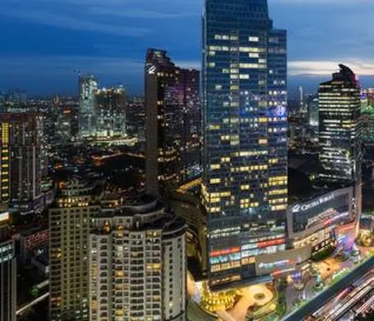 Jakarta high-rise serviced residence at night