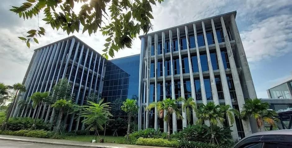 Low-rise office and warehouse campus among trees